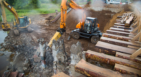 Демонтаж опор моста гидромолотом Delta 12S